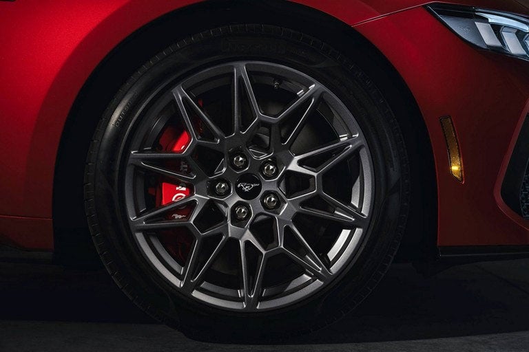 2024 Ford Mustang® model with a close-up of a wheel and brake caliper | Swant Graber Ford in Barron WI