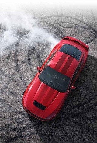 Overhead view of a 2024 Ford Mustang® model with tire tracks on pavement | Swant Graber Ford in Barron WI
