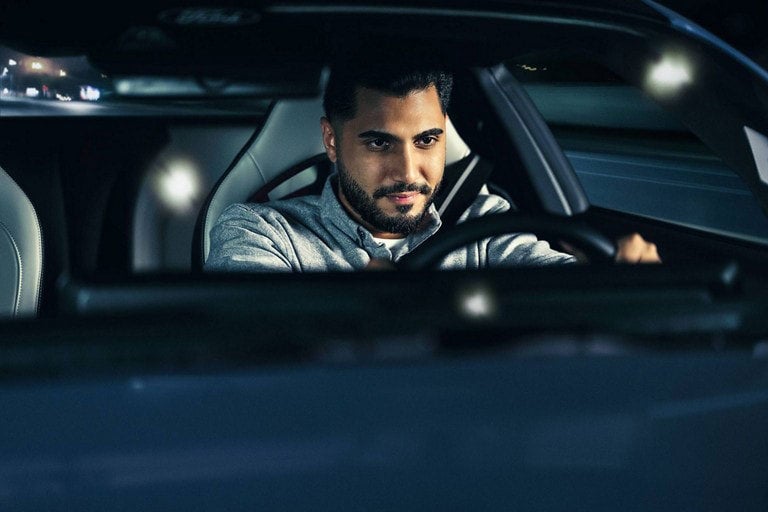 Person sitting in the driver’s seat of a parked 2024 Ford Mustang® coupe | Swant Graber Ford in Barron WI